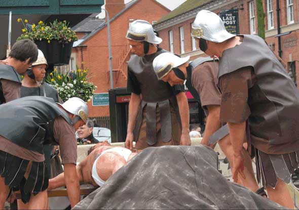 Jesus is nailed to the cross